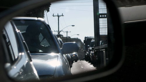 Side mirror looking on the traffic