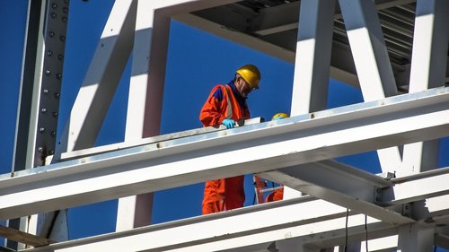 Construction worker on the pillars